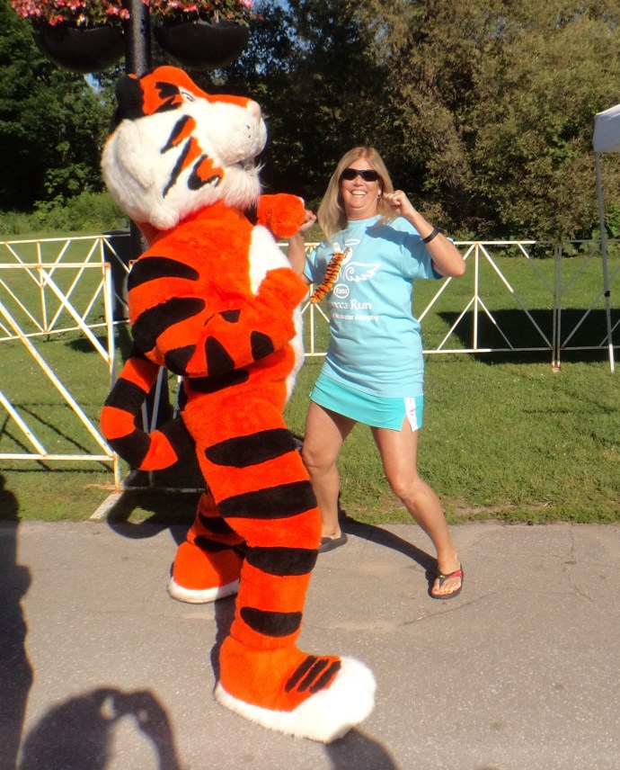 Tony the Esso Tiger and Glenis whooping it up!